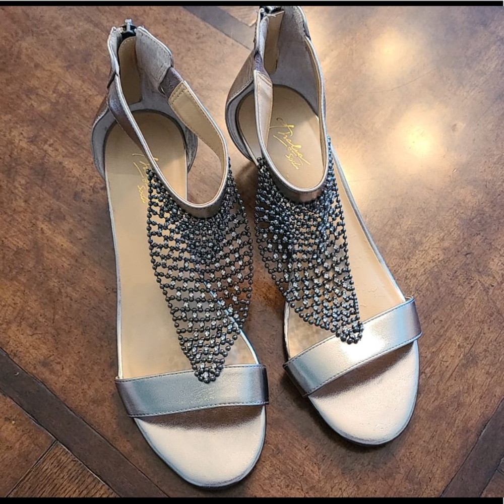 Silver wedge heels with crystal net detailing